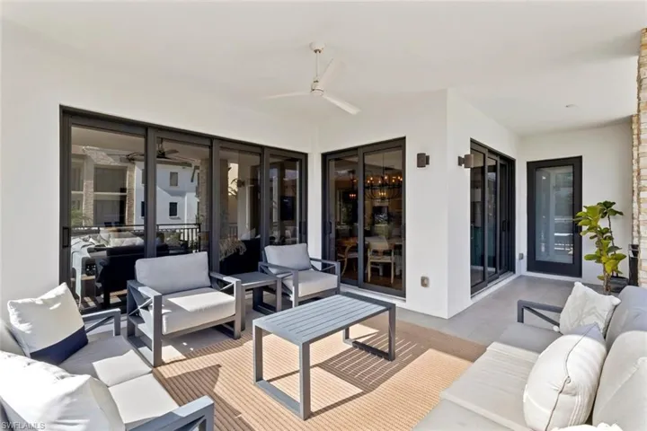 View of patio / terrace with an outdoor living space and a ceiling fan