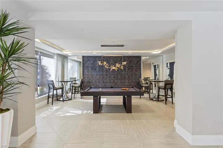 Recreation room with billiards table