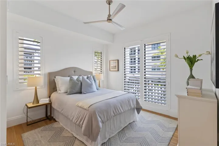 Bedroom featuring light wood-style flooring and ceiling fan