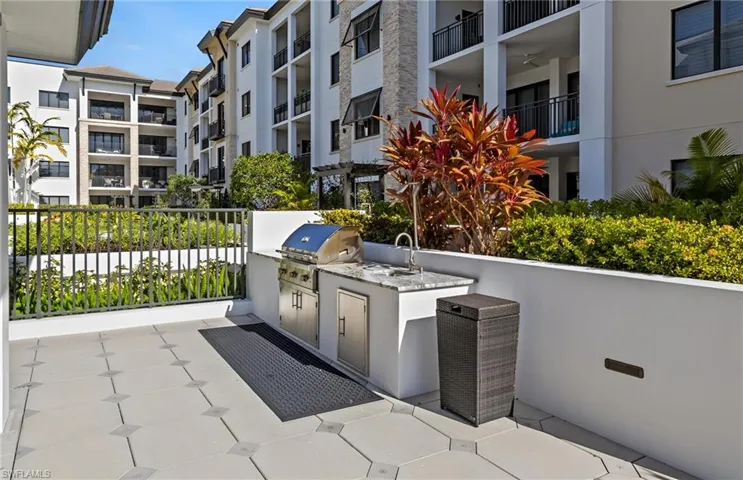 View of patio / terrace featuring area for grilling and a sink