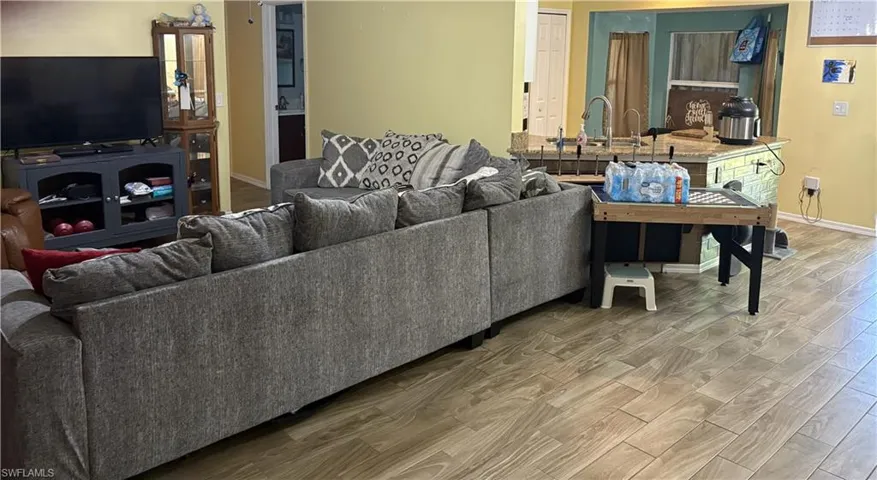 Living area featuring wood finished floors