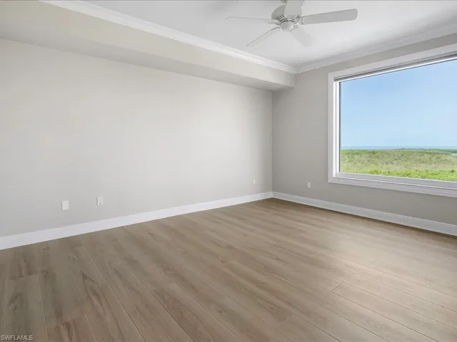 Master Bedroom with picture-window of the Gulf...