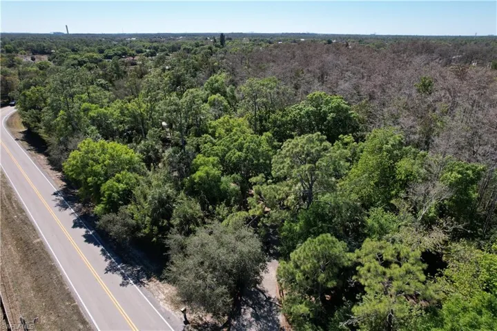 Drone / aerial view of a heavily wooded area