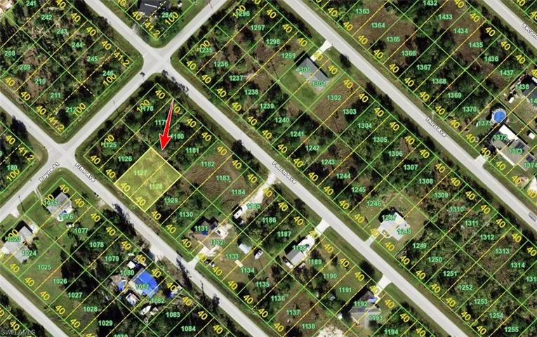 Aerial overview of property's location with property parcel outlined