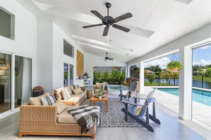 Lanai features electric screens, jacuzzi/spa and outdoor kitchen