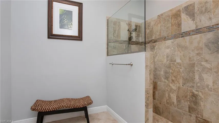 Bathroom with tiled shower