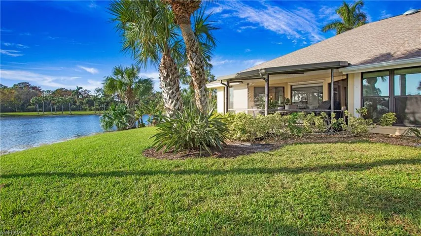 View of yard with a water view