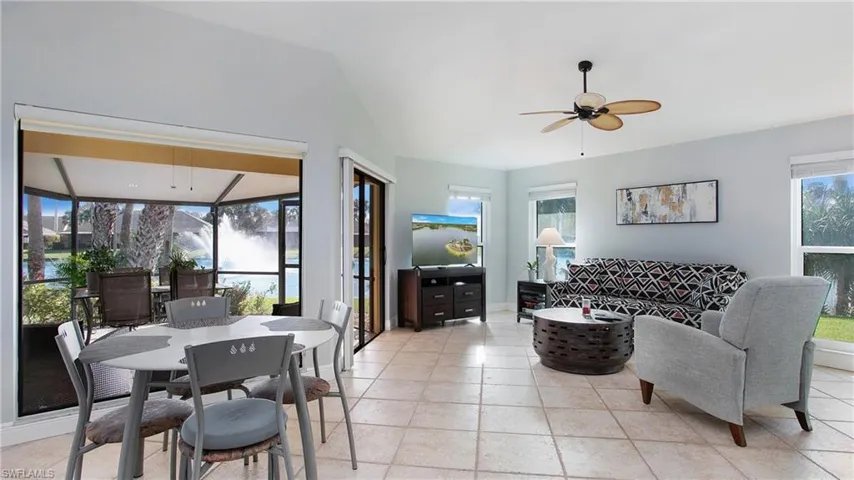 Tiled living room with ceiling fan