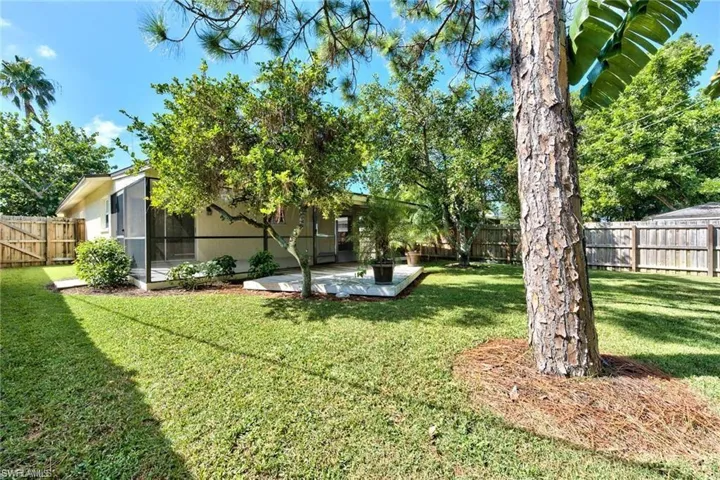View of yard featuring a patio area and a fenced backyard