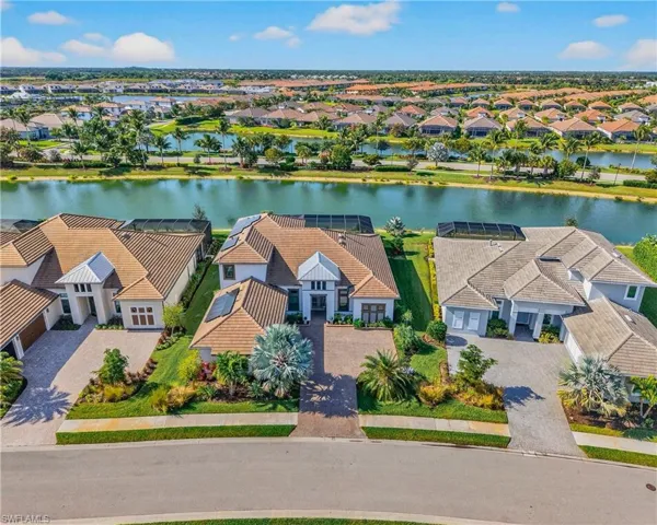 Aerial view of residential area with a large body of water