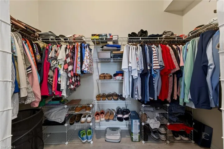 Walk in closet featuring light wood-type flooring