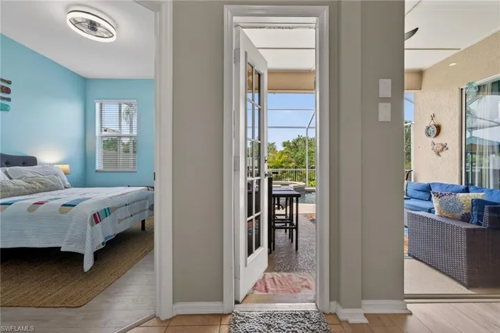 Bedroom featuring light wood finished floors and baseboards