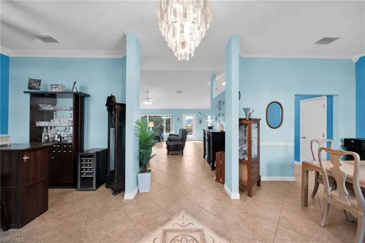 Beautiful Entry with Den and Formal Dining, Decorative Tile, Cove MoldingLot's of Light!
