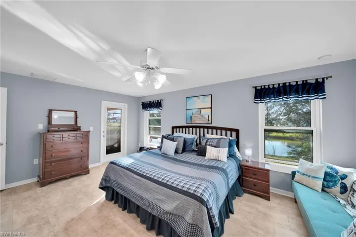 Master Bedroom with access to Screened Lanai, Water View