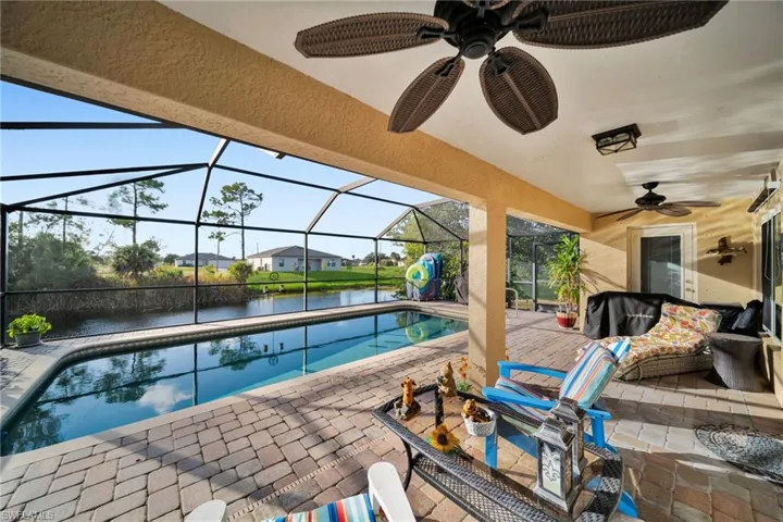Screened Solar Heated Pool, Paver Lanai, Extended Covered sitting with a Private Fresh Water View