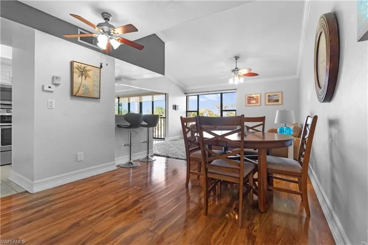 Woodlike flooring with tile in the kitchen and baths