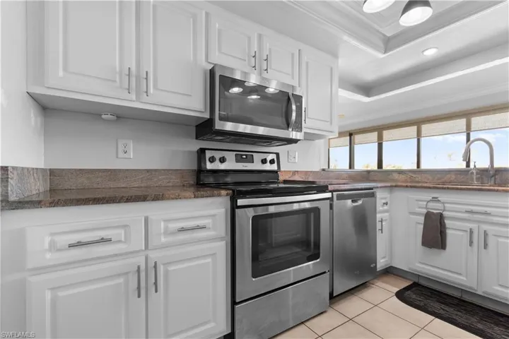 Beautiful granite counters and plenty of cabinets