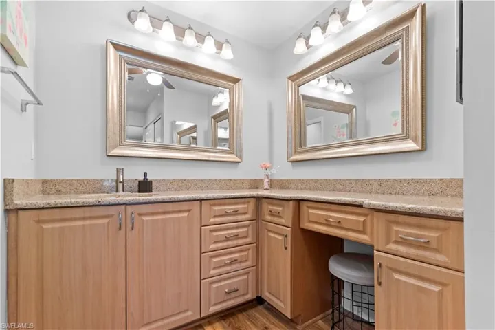 Your primary bath features pull-out shelving