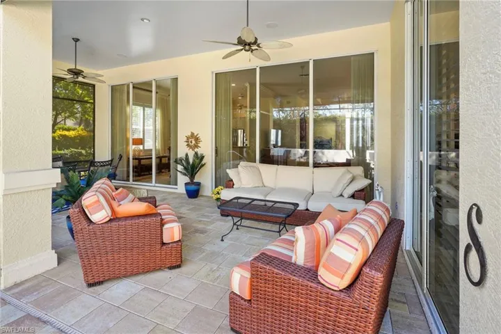 View of patio / terrace with an outdoor hangout area and ceiling fan