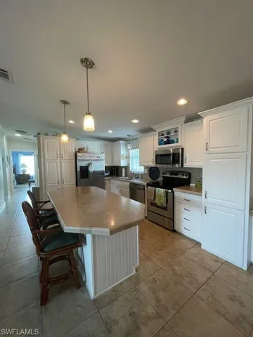 1100  Diamond Lake  CIR, Naples, FL 34114