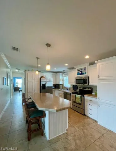 1100  Diamond Lake  CIR, Naples, FL 34114