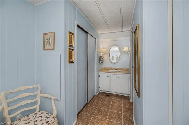 Bathroom featuring vanity and a textured ceiling