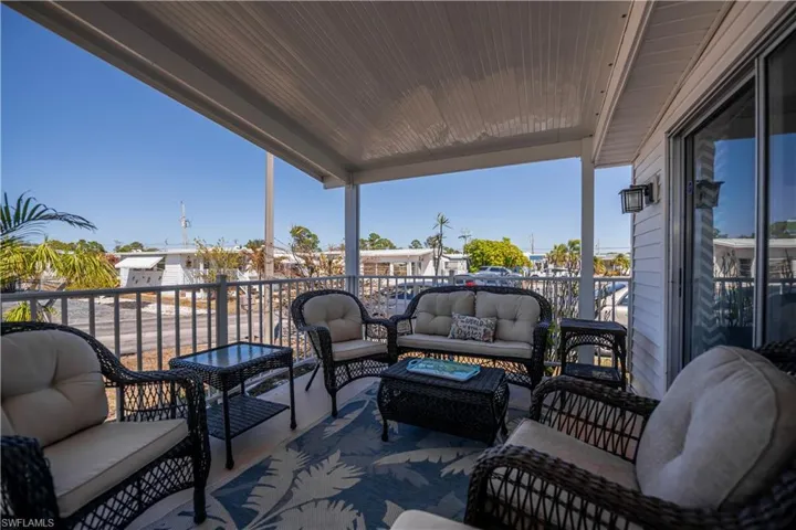 Patio / terrace with an outdoor hangout area