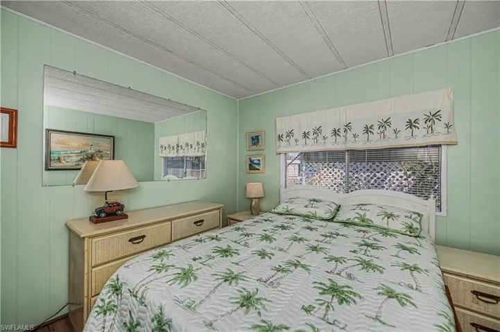 Bedroom with wooden walls