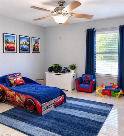 Bedroom featuring light-toned neutral walls, polished tile flooring, and a multi-blade ceiling fan with an integrated light fixture