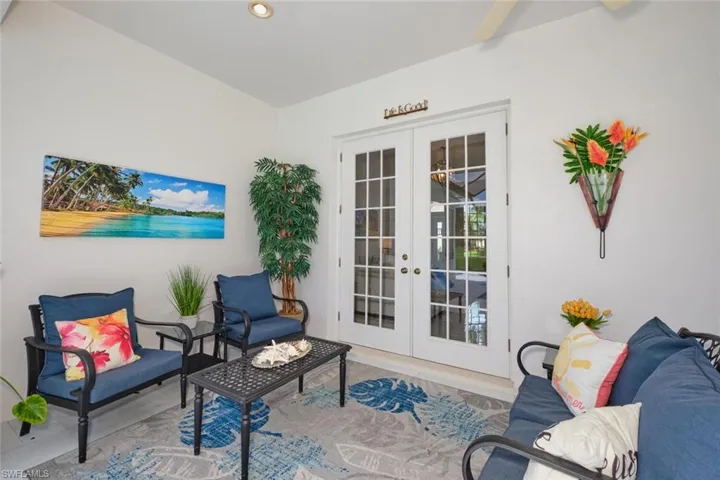 Sitting room featuring french doors