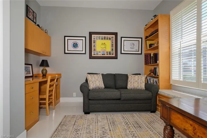 Living room featuring light tile patterned floors