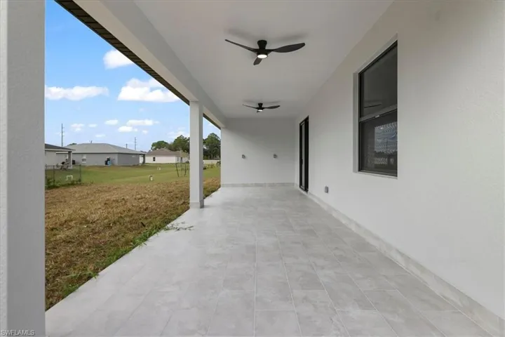 View of patio with ceiling fan