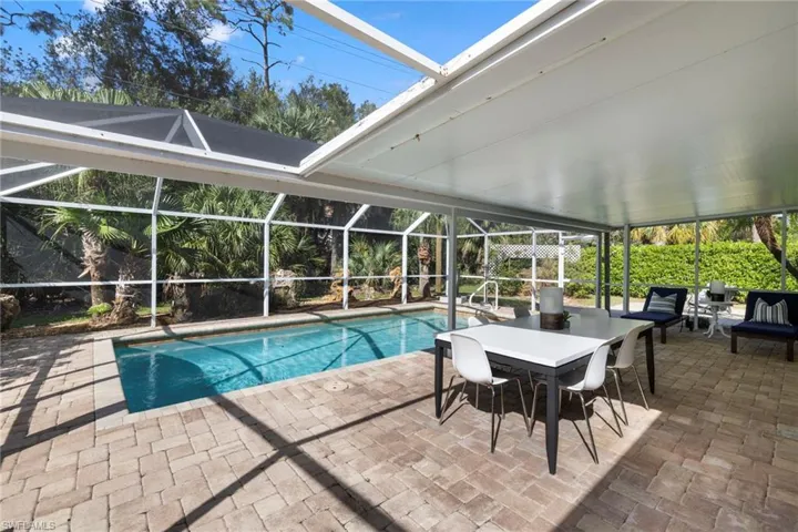 View of screened patio and pool