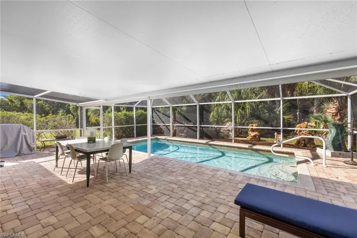 View of screened patio and pool