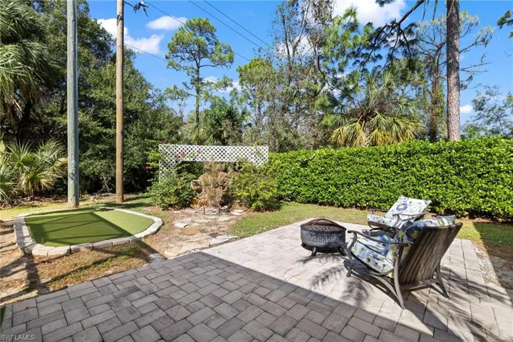 Paved patio and putting green