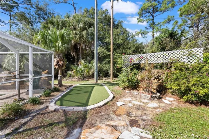 Paved patio and putting green