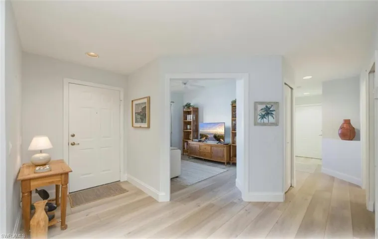 Foyer entrance featuring recessed lighting and light wood-style flooring