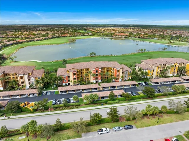 Birds eye view of property featuring a residential view and a water view