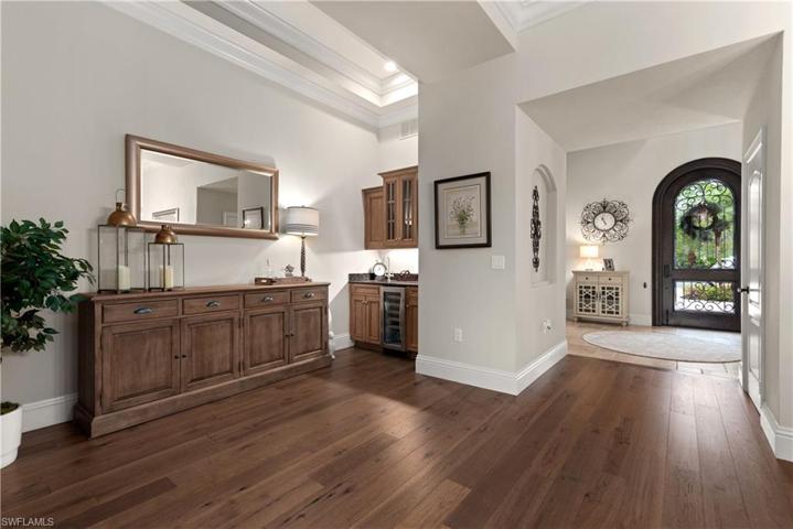Built-in Bar with Granite Counters and sink.