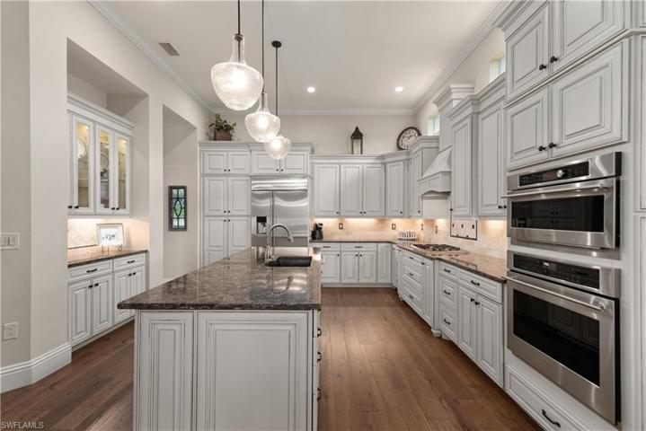 Lots of cabinets with large island