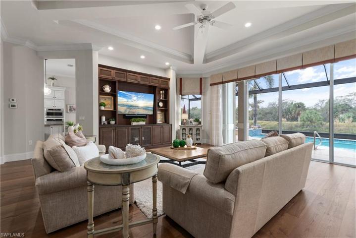 Views of pool & spa overlooking water feature from wall of sliding glass doors.