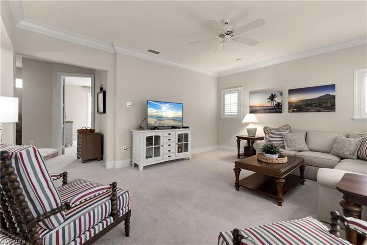 Upstairs Second Family Room with crown molding and Plantation Shutters