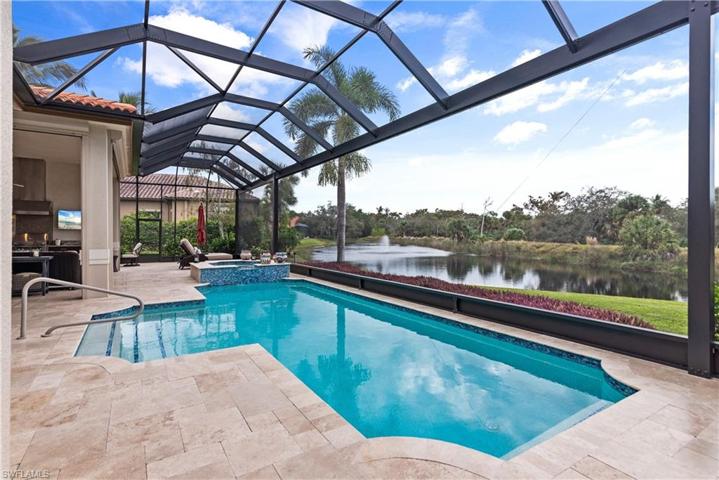 Step entry into pool with views of water feature, pood and preserve areas