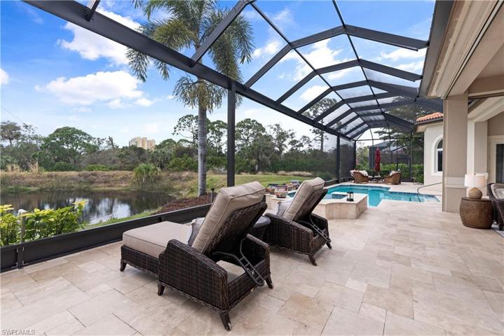 Expanded lanai area with views of pond, preserve and Amazing Sunset Views!!