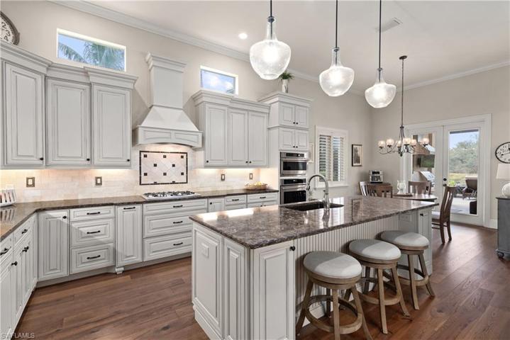 Newly designed with Quartz counters, transom windows and breakfast bar