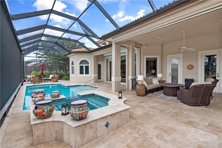 Spa overflows into pool with new Travertine pool deck
