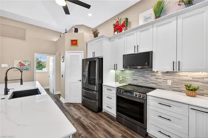 Cabinets and drawers are slow close. There is also a built in spice rack