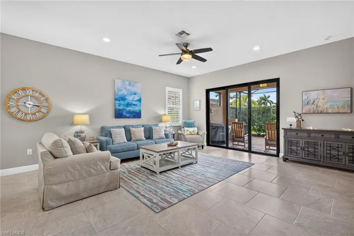 Large, open living area with access to large patio/lanai