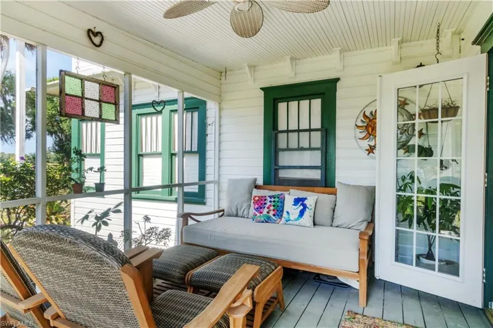 Screened sunroom with ceiling fan
