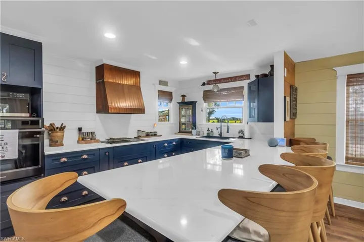 Kitchen: Quartz counter tops, updated appliances and hardware